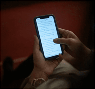 person reading an article on their cellphone